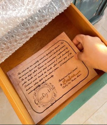 Signed story card inside a restored drawer